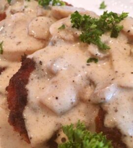 Fried Pork Chops With Creamy Mushroom Gravy